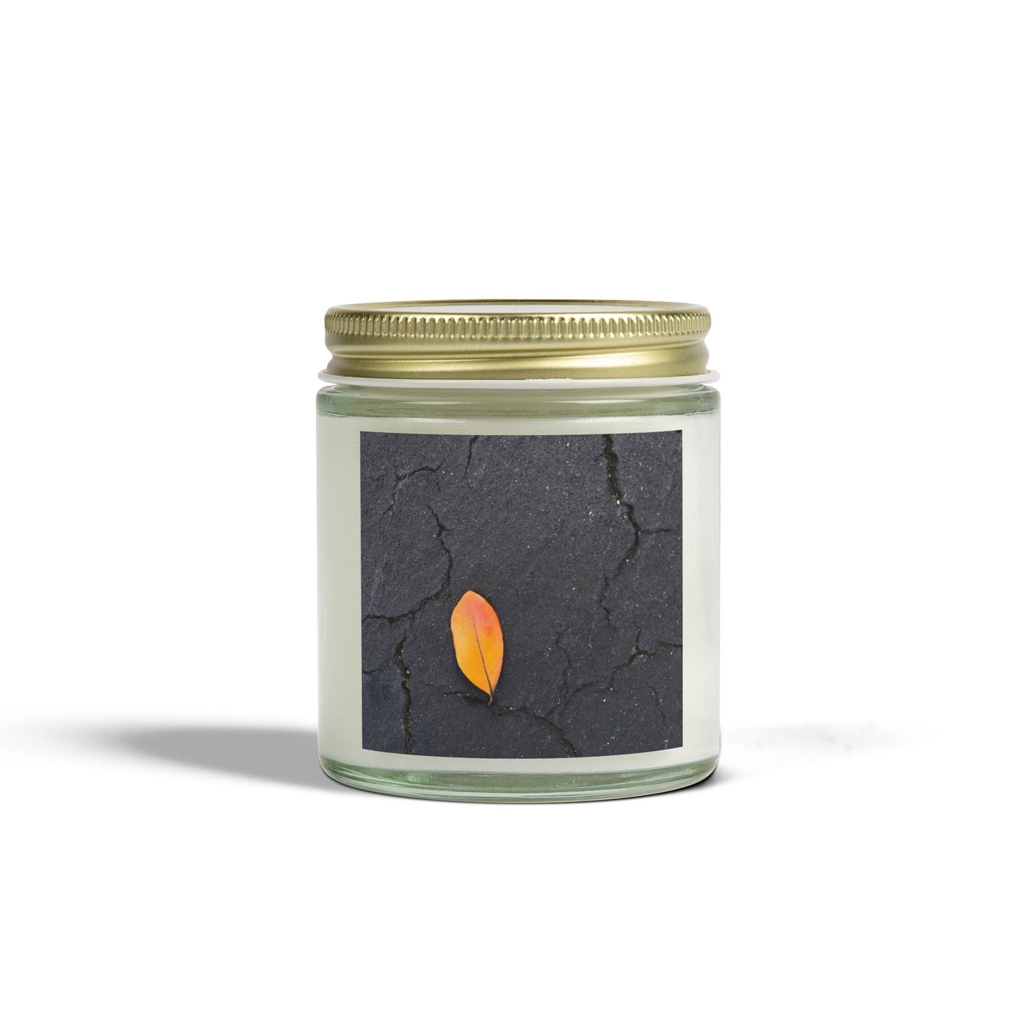 Orange Leaf on Black Concrete Jar Candle – Minimalist Autumn Decor with Urban Nature-Inspired Photography and Moody Fall Aesthetic
