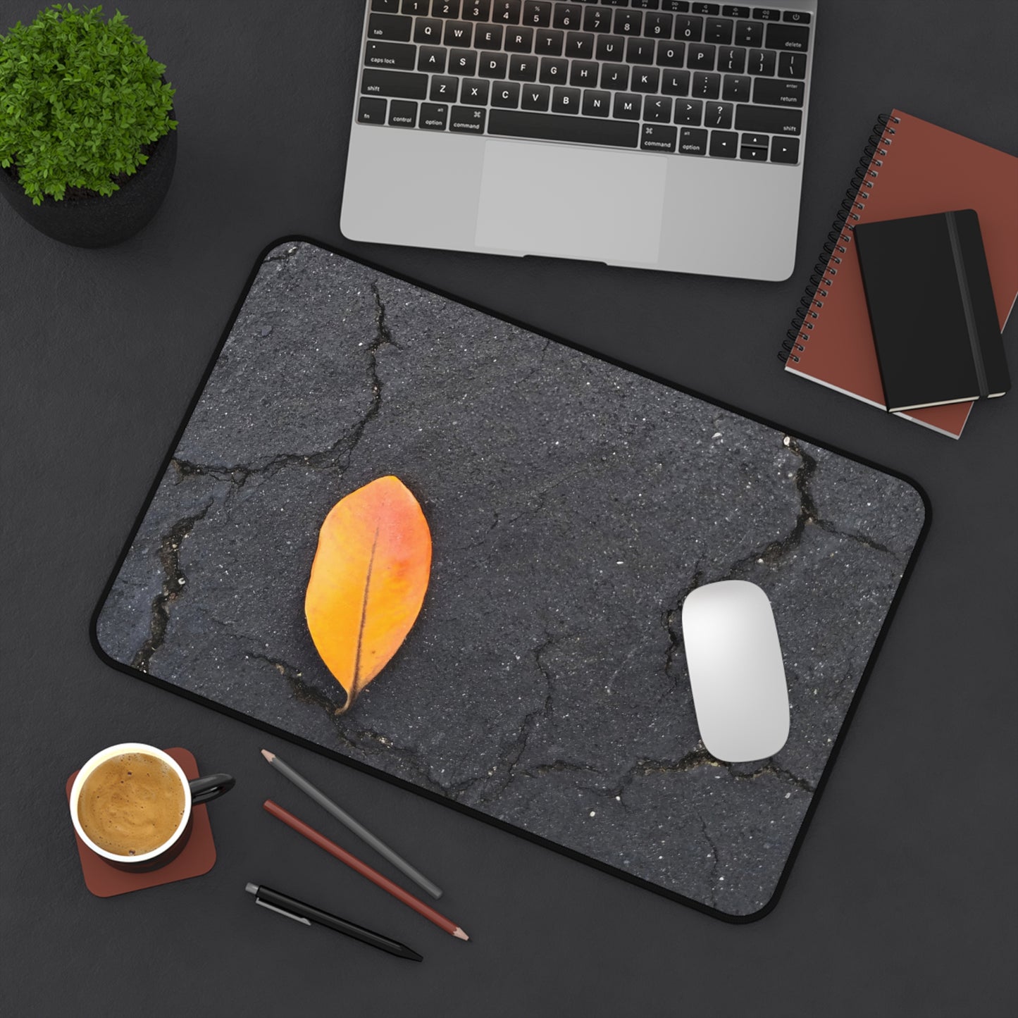 Orange Leaf Against Black Concrete Desk Mat – Minimalist Modern Nature-Inspired Tabletop Decor