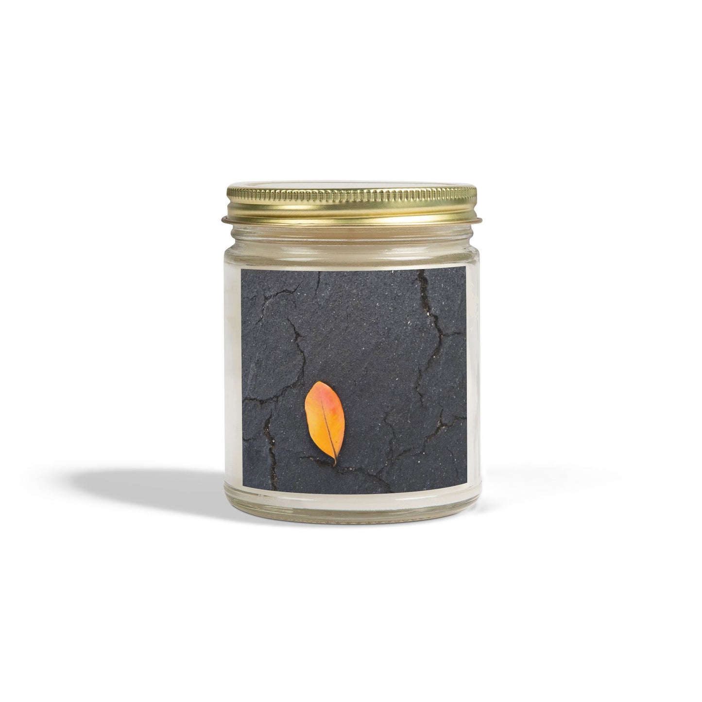 Orange Leaf on Black Concrete Jar Candle – Minimalist Autumn Decor with Urban Nature-Inspired Photography and Moody Fall Aesthetic