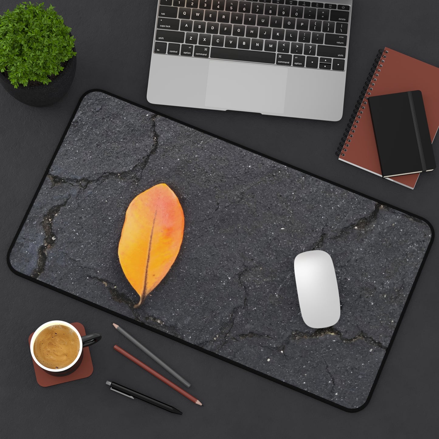 Orange Leaf Against Black Concrete Desk Mat – Minimalist Modern Nature-Inspired Tabletop Decor