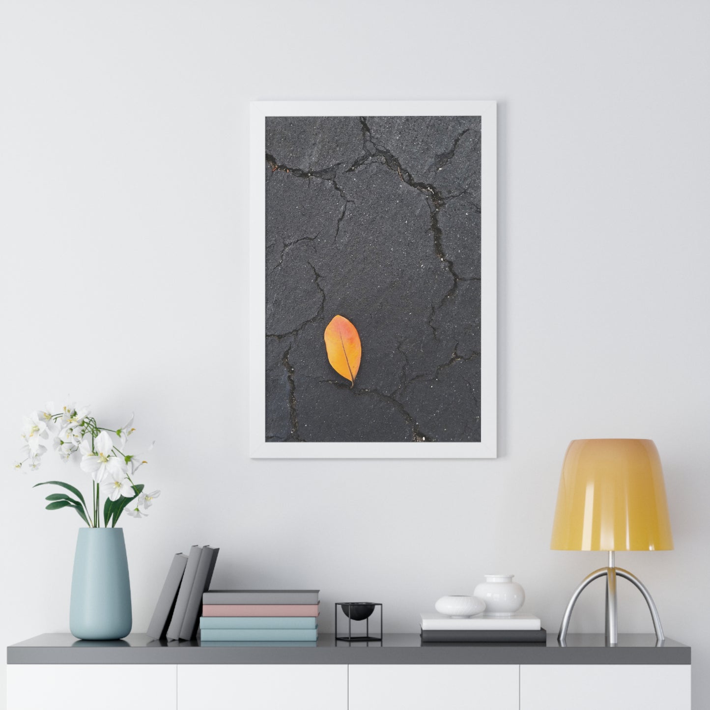 Orange Leaf on Black Concrete Framed Print – Minimalist Autumn Wall Art for Urban and Modern Rustic Decor