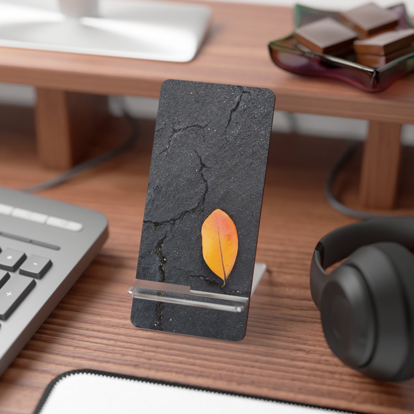 Orange Leaf Against Black Concrete Phone Stand – Minimalist Nature Photography Phone Holder