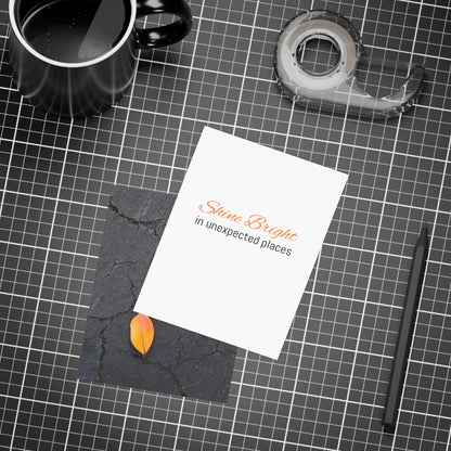 Orange Leaf on Black Concrete Inspirational Postcard – Minimalist Autumn Decor for Modern Homes
