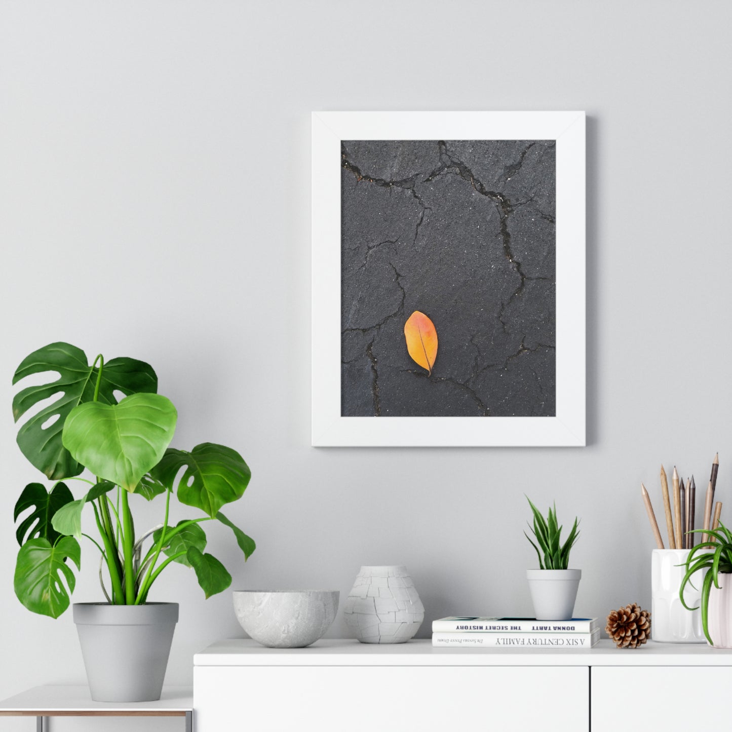 Orange Leaf on Black Concrete Framed Print – Minimalist Autumn Wall Art for Urban and Modern Rustic Decor