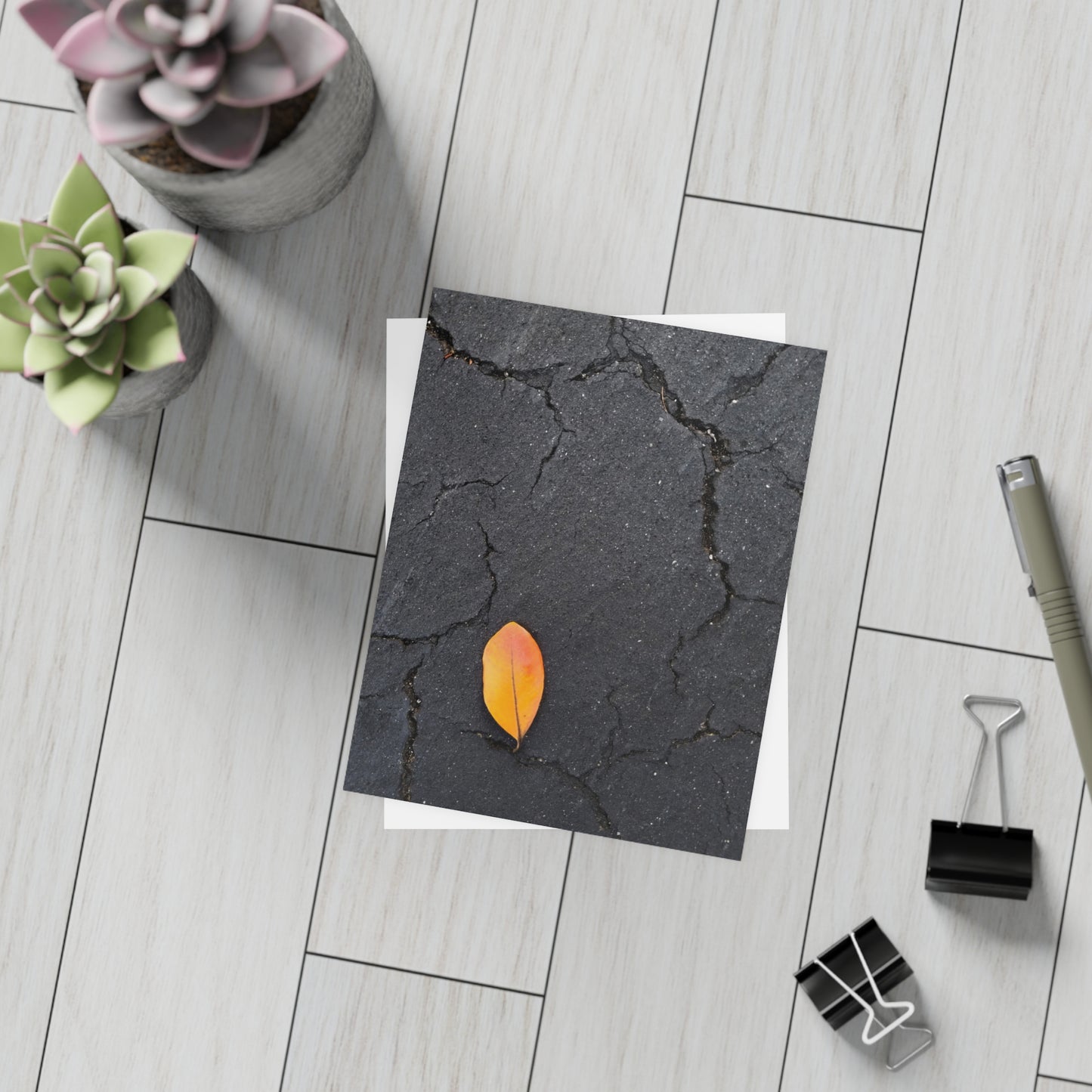 Orange Leaf on Black Concrete Inspirational Postcard – Minimalist Autumn Decor for Modern Homes