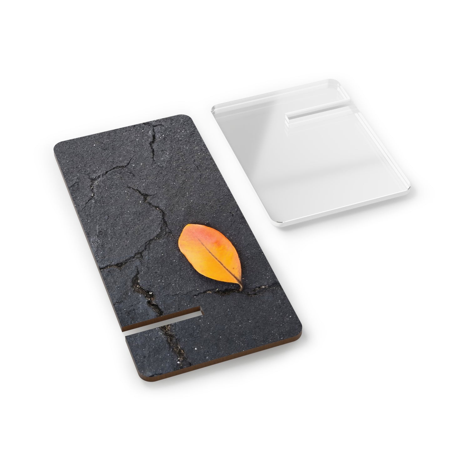Orange Leaf Against Black Concrete Phone Stand – Minimalist Nature Photography Phone Holder
