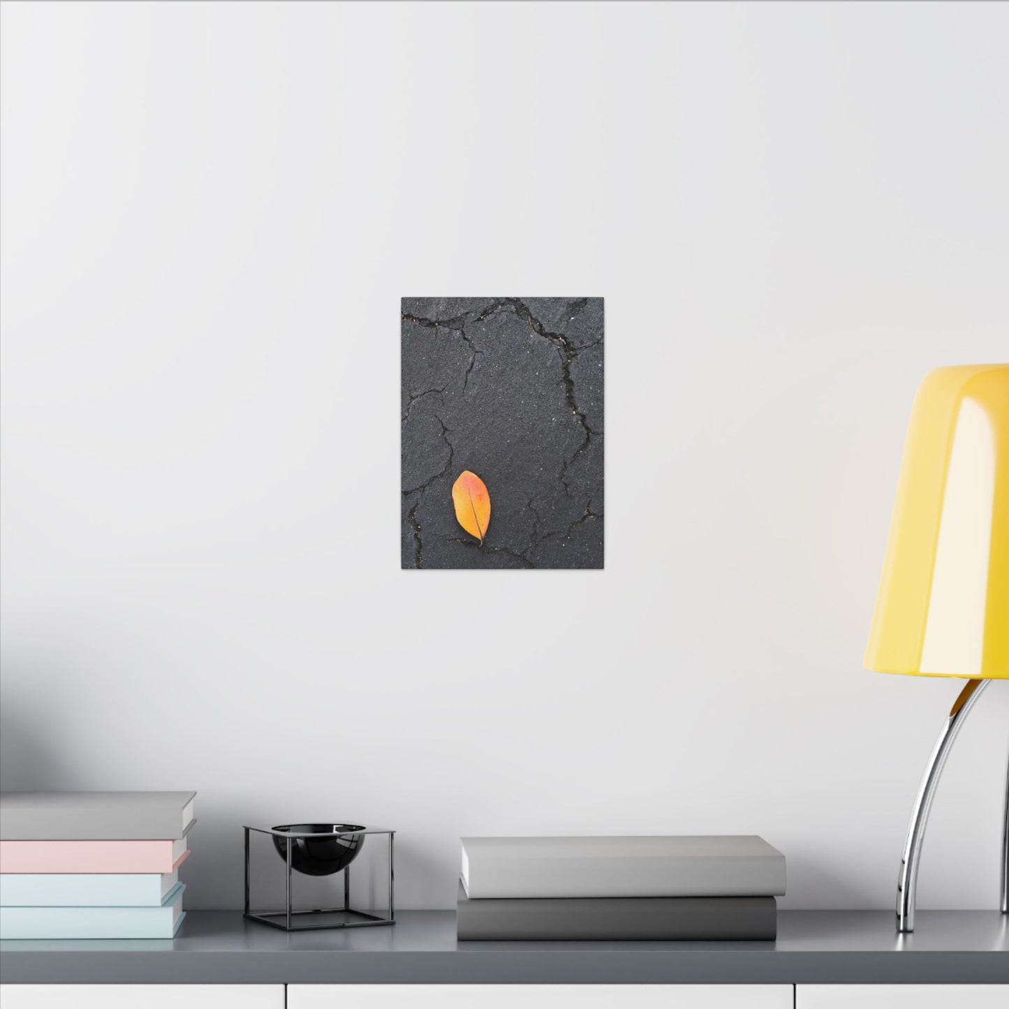 Orange Leaf Against Black Concrete Minimalistic Canvas Print – Contemporary Nature Photography Wall Art