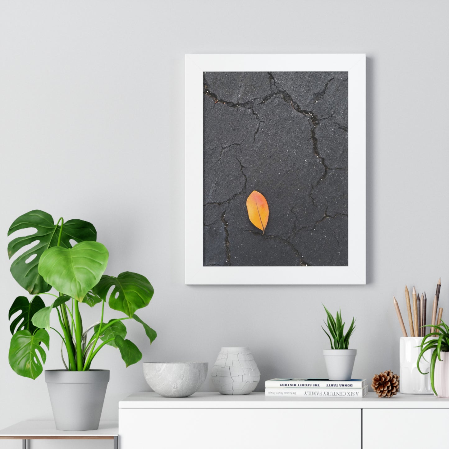 Orange Leaf on Black Concrete Framed Print – Minimalist Autumn Wall Art for Urban and Modern Rustic Decor